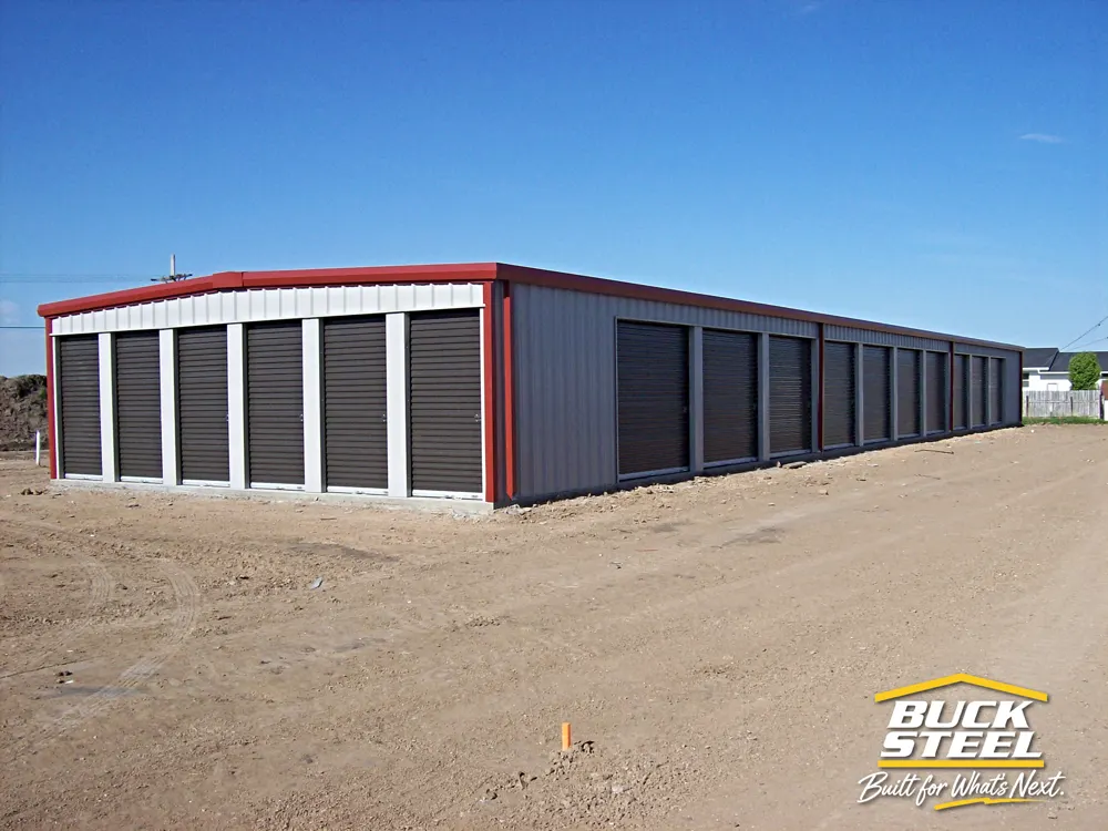 Buck Steel storage building with dark rollup doors